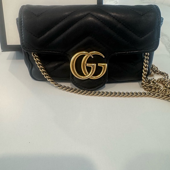Gucci Handbags - Gucci Black Quilted Crossbody Bag with Gold Chain